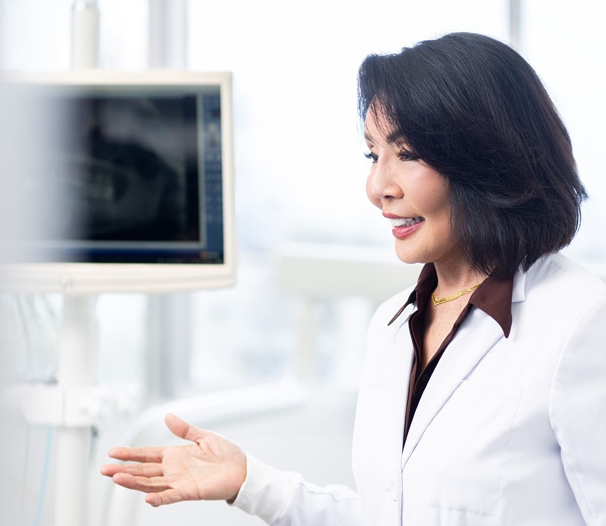 Marina Del Rey dentist Dr. Rosita Tan in a dental exam